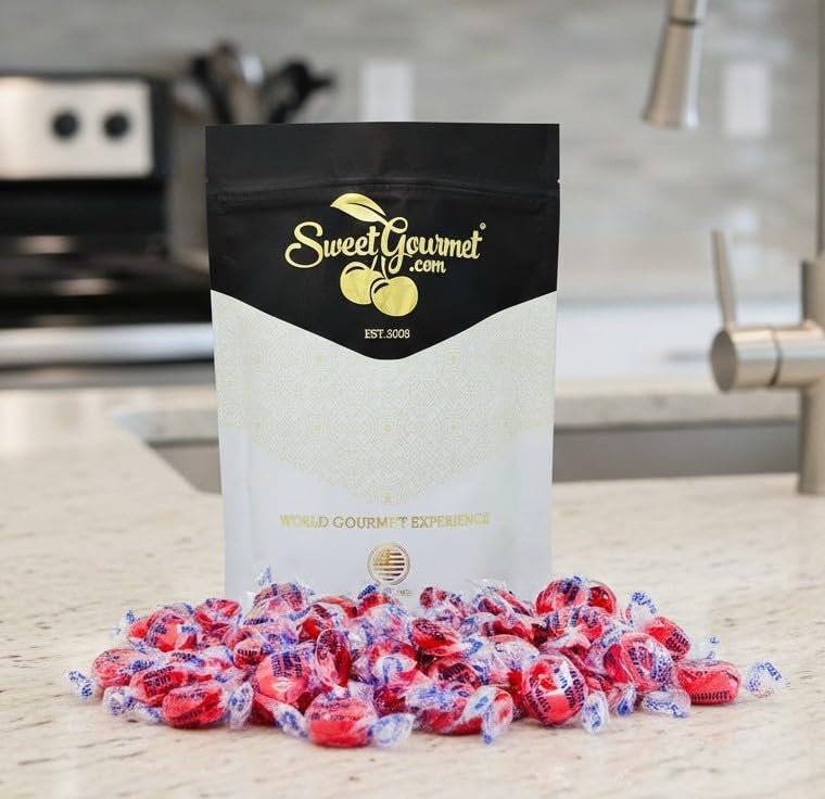 SweetGourmet on an office desk near coffee cup to show quick grab-and-go treat option
