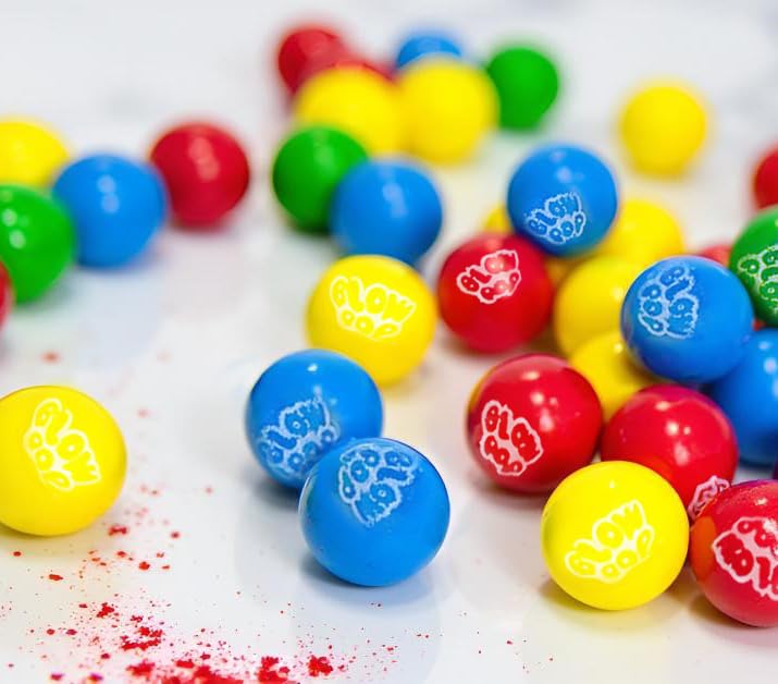 SweetGourmet gumballs in party bowl on table setting adding colorful dessert buffet appeal