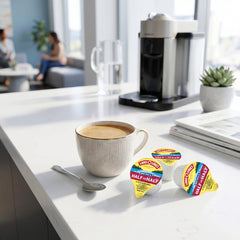 SWEETSIDE CANDY CO. creamer pouring into coffee showing creamy color and flavor boost