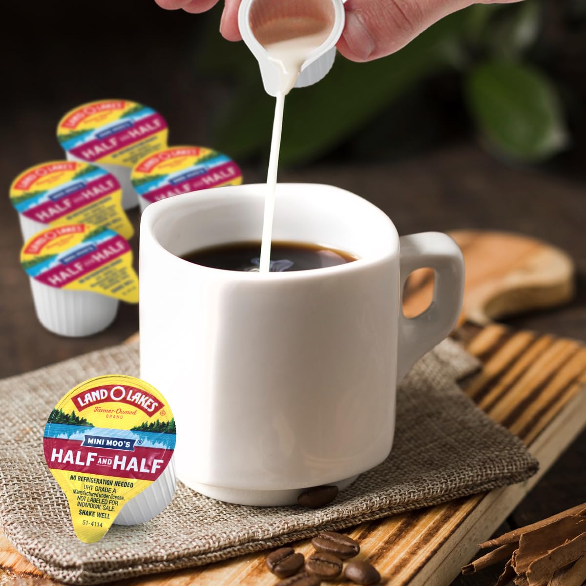 SWEETSIDE CANDY CO. creamer cup next to mug showing actual size and portion control