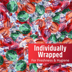 SWEETSIDE candy in hand to illustrate piece size and portable on-the-go benefit