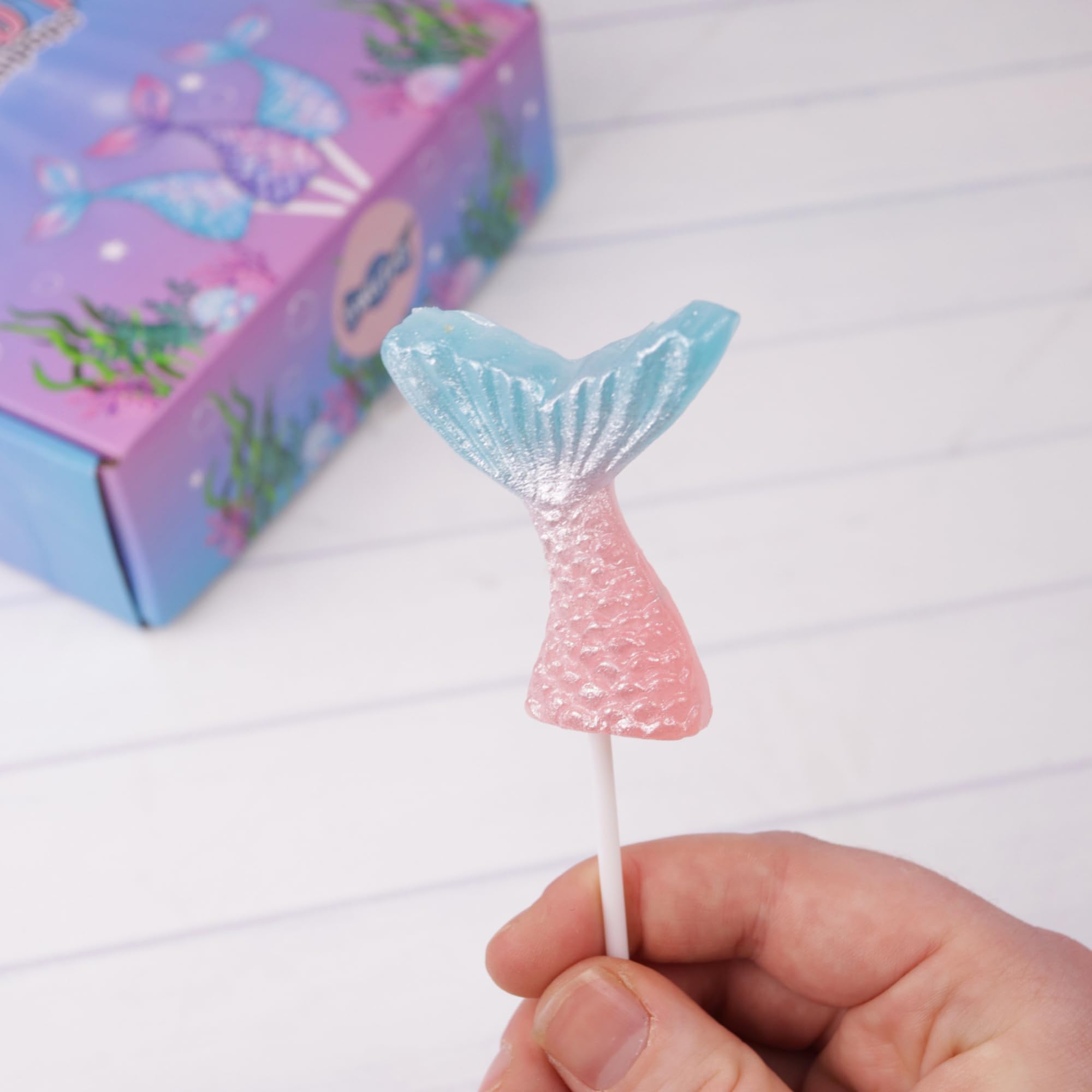 Sweetzo party table display with lollipops adding themed decoration and charm