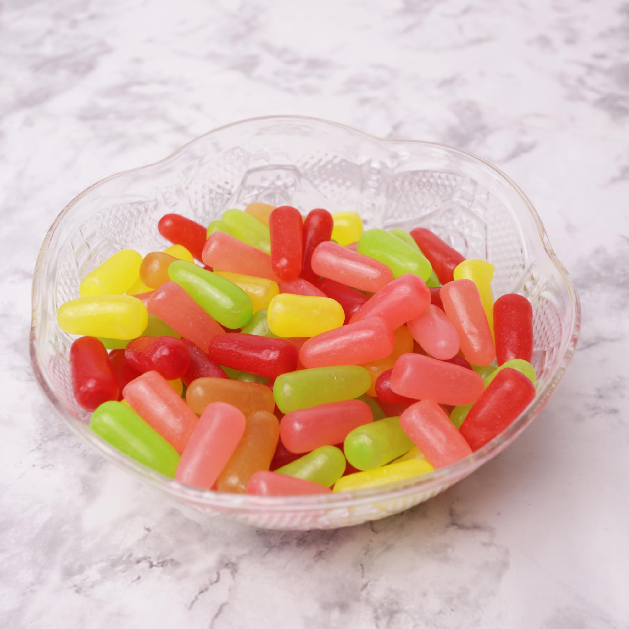 Sweetzo Mike and Ike candies in a clear bowl ready for parties and easy sharing