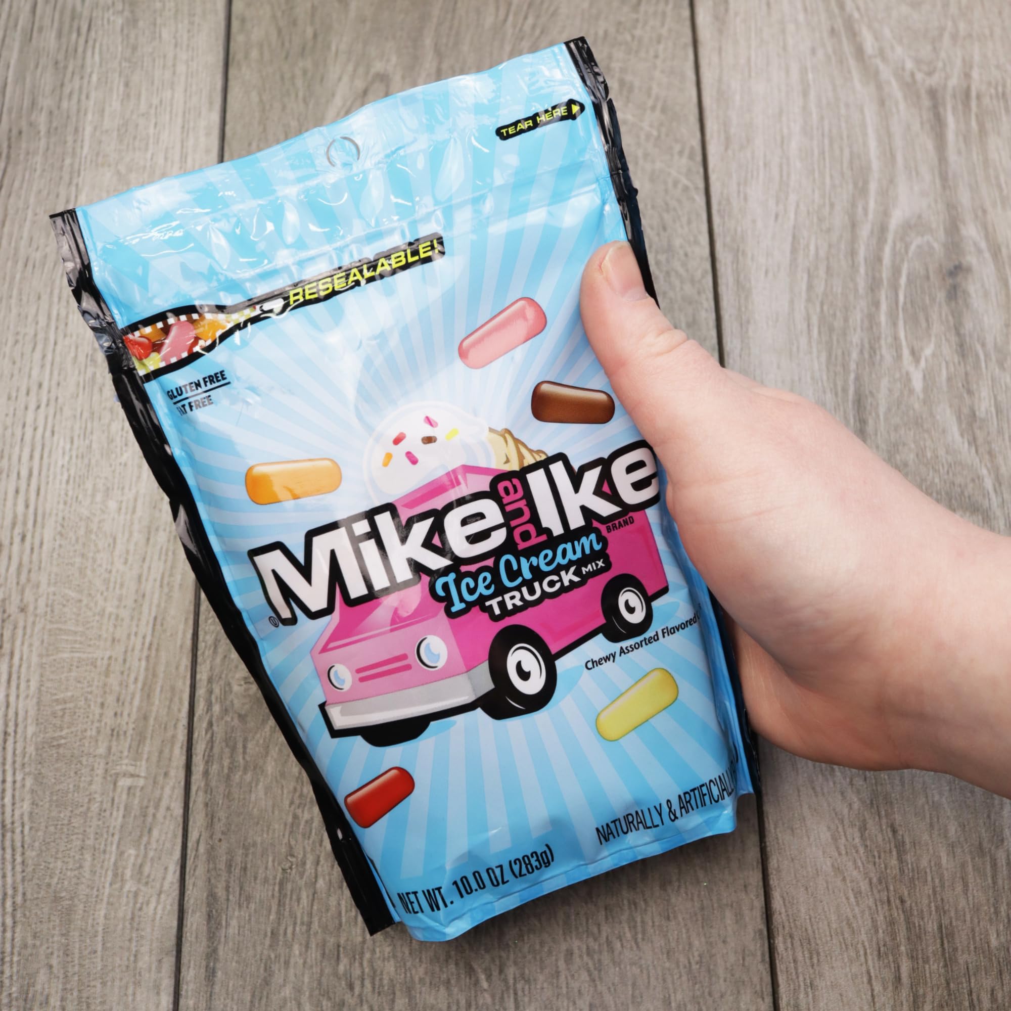Sweetzo Mike and Ike shown in hand for scale illustrating convenient 10-ounce resealable size