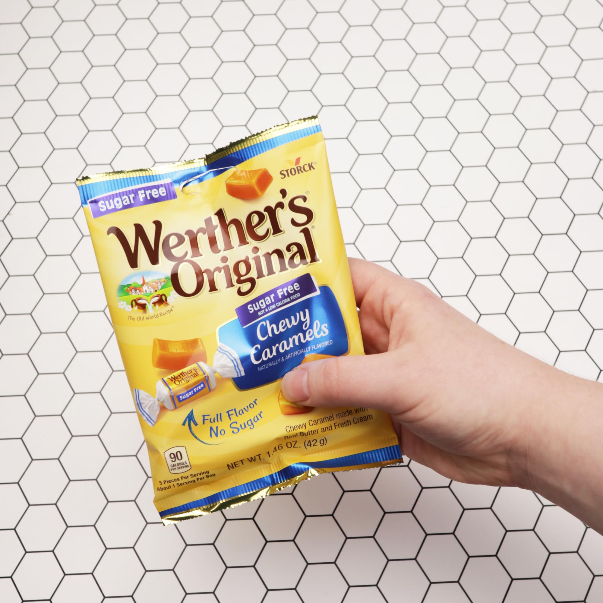 Sweetzo Werther's pouch beside a coin for size comparison to show compact portability