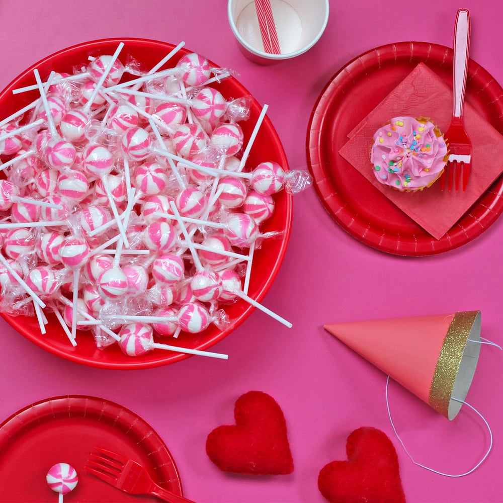SWIRLEEY ball-shaped lollipop texture close-up showing swirl detail and benefit: longer-lasting treat