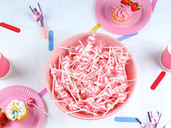 SWIRLEEY bowl of pink lollipops on candy buffet showing decorative appeal and benefit: instant décor