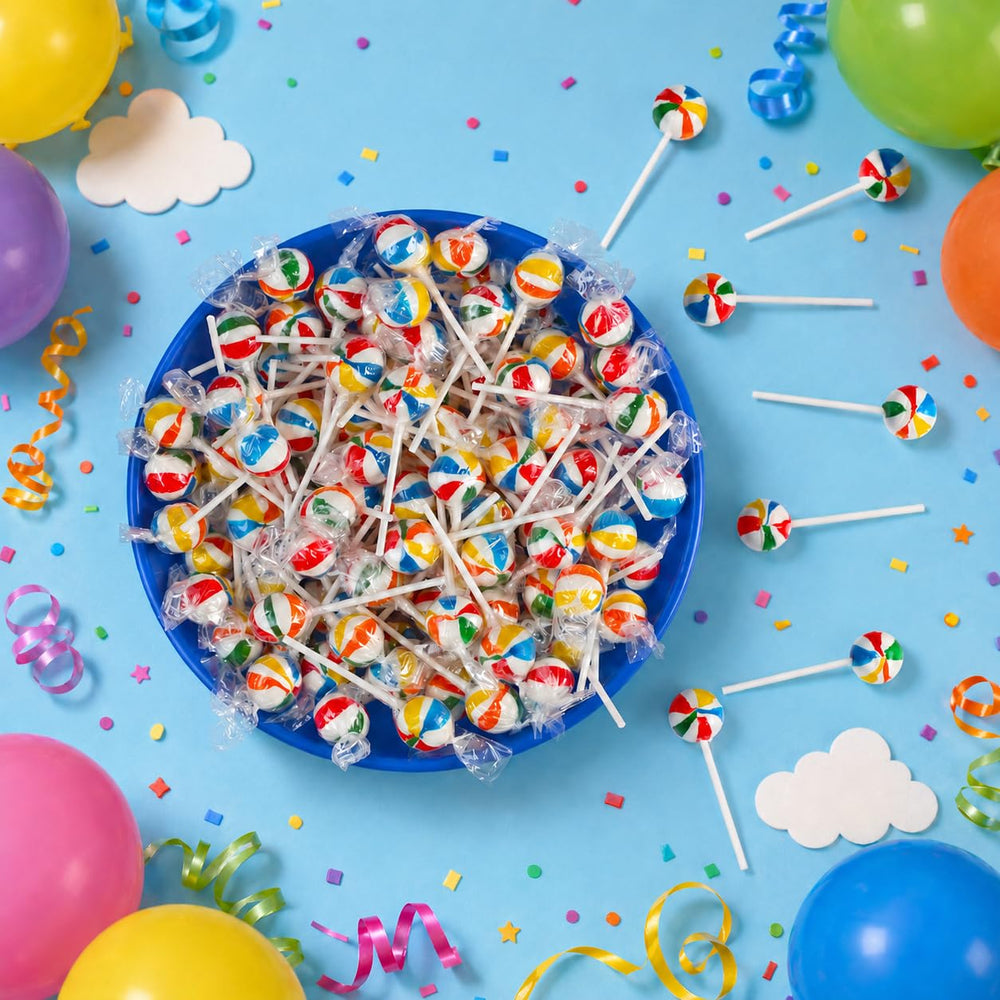 SWIRLEEY lollipops next to ruler showing approximate dimensions