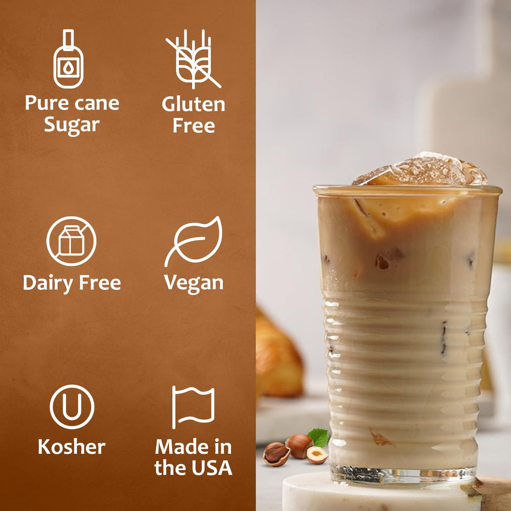 Top view of a latte flavored with Syruvia hazelnut syrup showing creamy foam