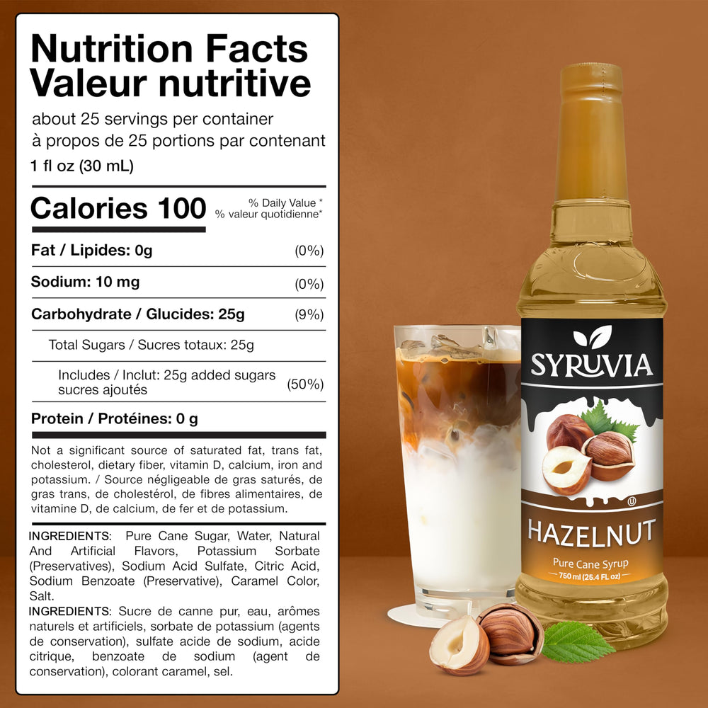 Pouring Syruvia hazelnut syrup into a glass to enhance beverage flavor