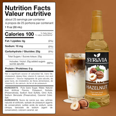 Pouring Syruvia hazelnut syrup into a glass to enhance beverage flavor