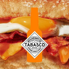 TABASCO-dressed pizza with drizzled sauce showing enhanced flavor benefit