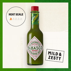 TABASCO green jalapeño pouring closeup adds vibrant flavor to food