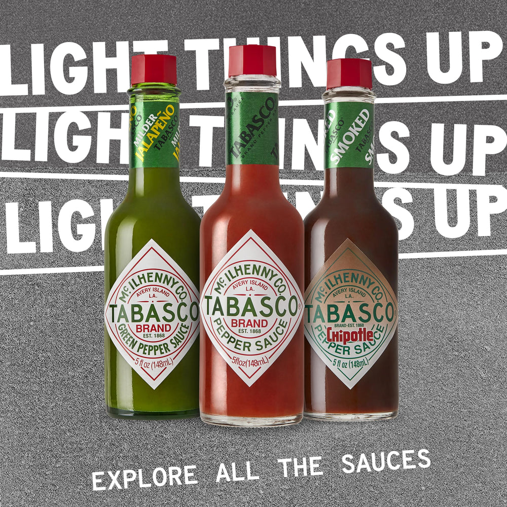 TABASCO scorpion drizzled on wings showing bright fruit-heat flavor enhancement