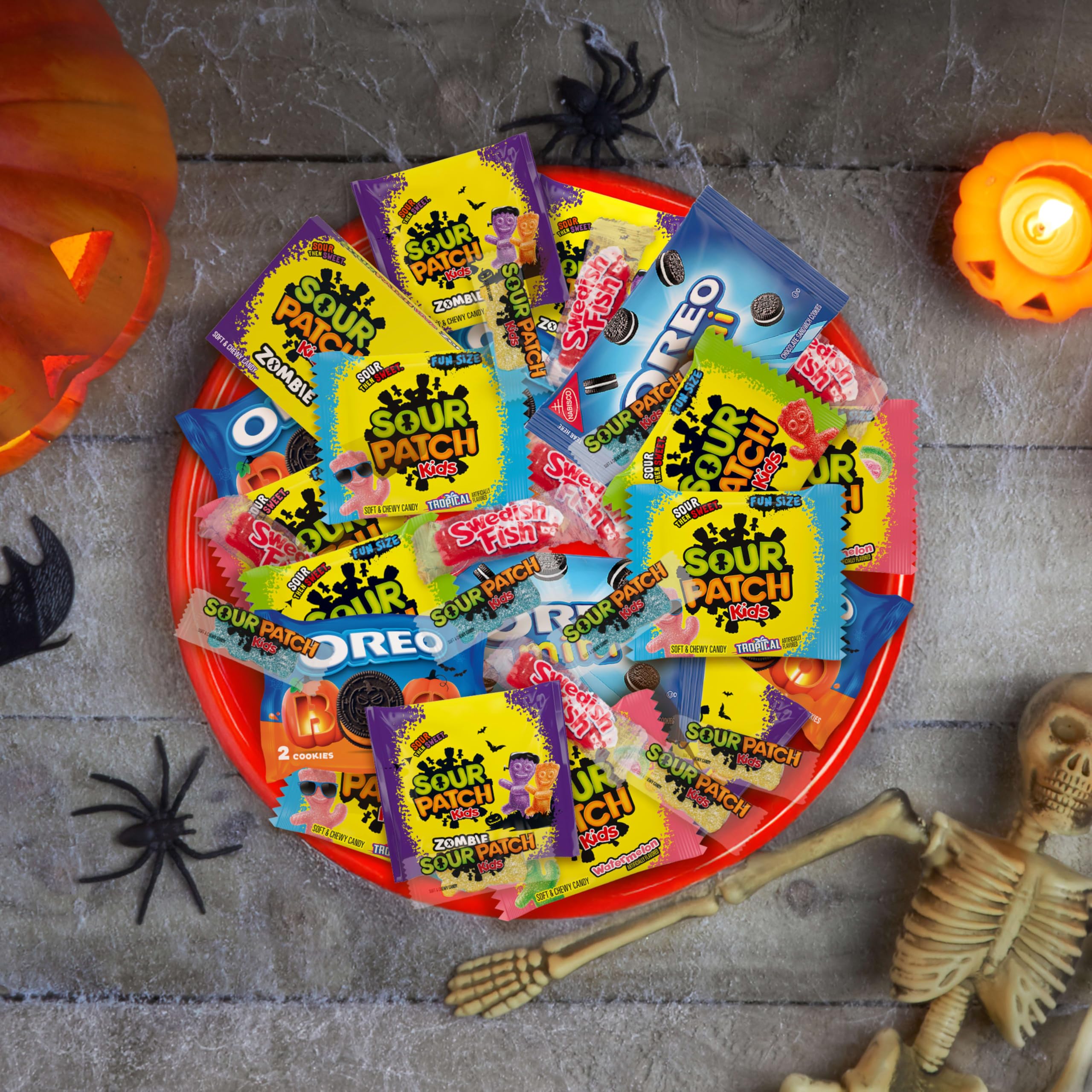 party favor setup with Sour Patch Kids variety packs arranged for guests and quick serving
