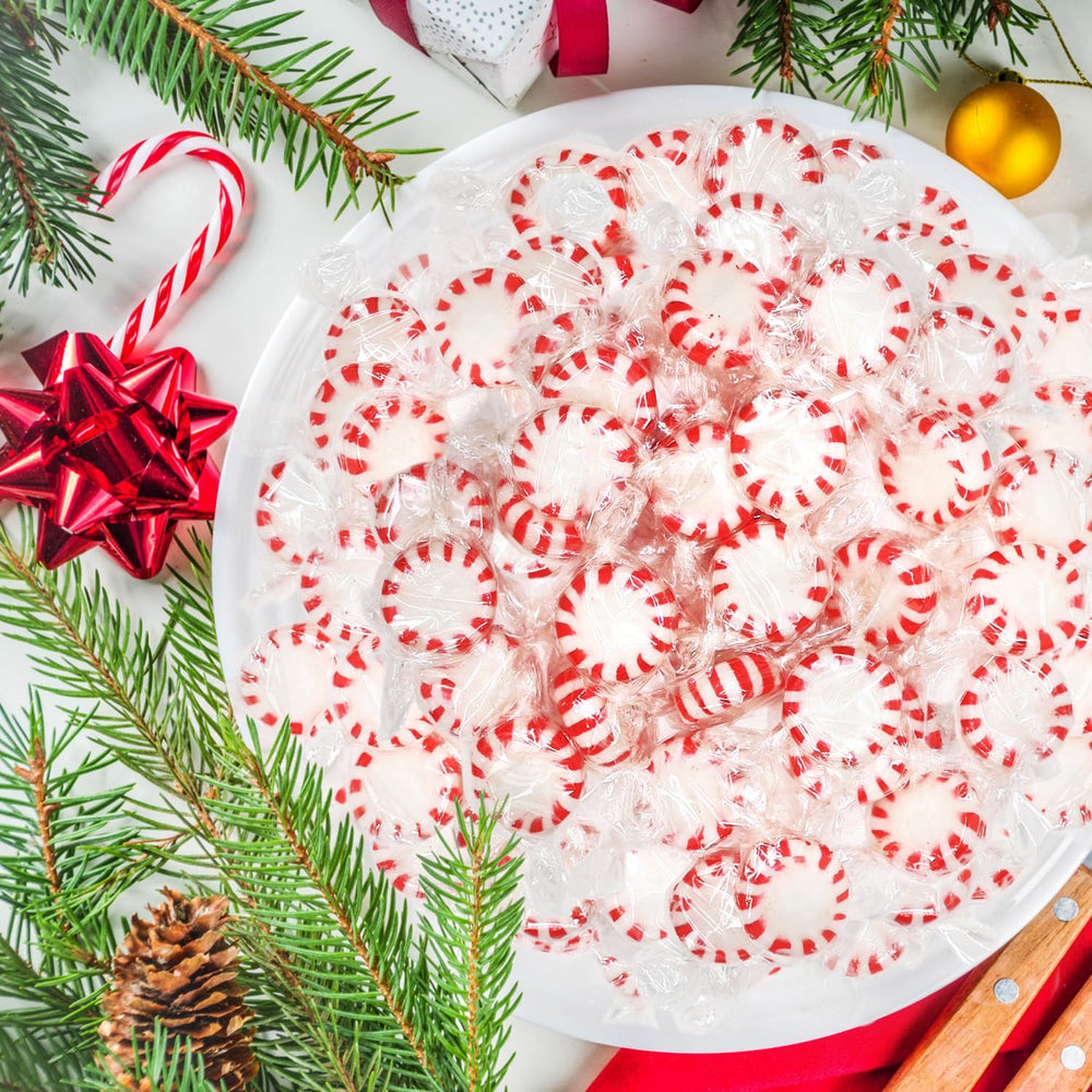 Taboom party table with peppermints on dessert spread, enhancing holiday decor