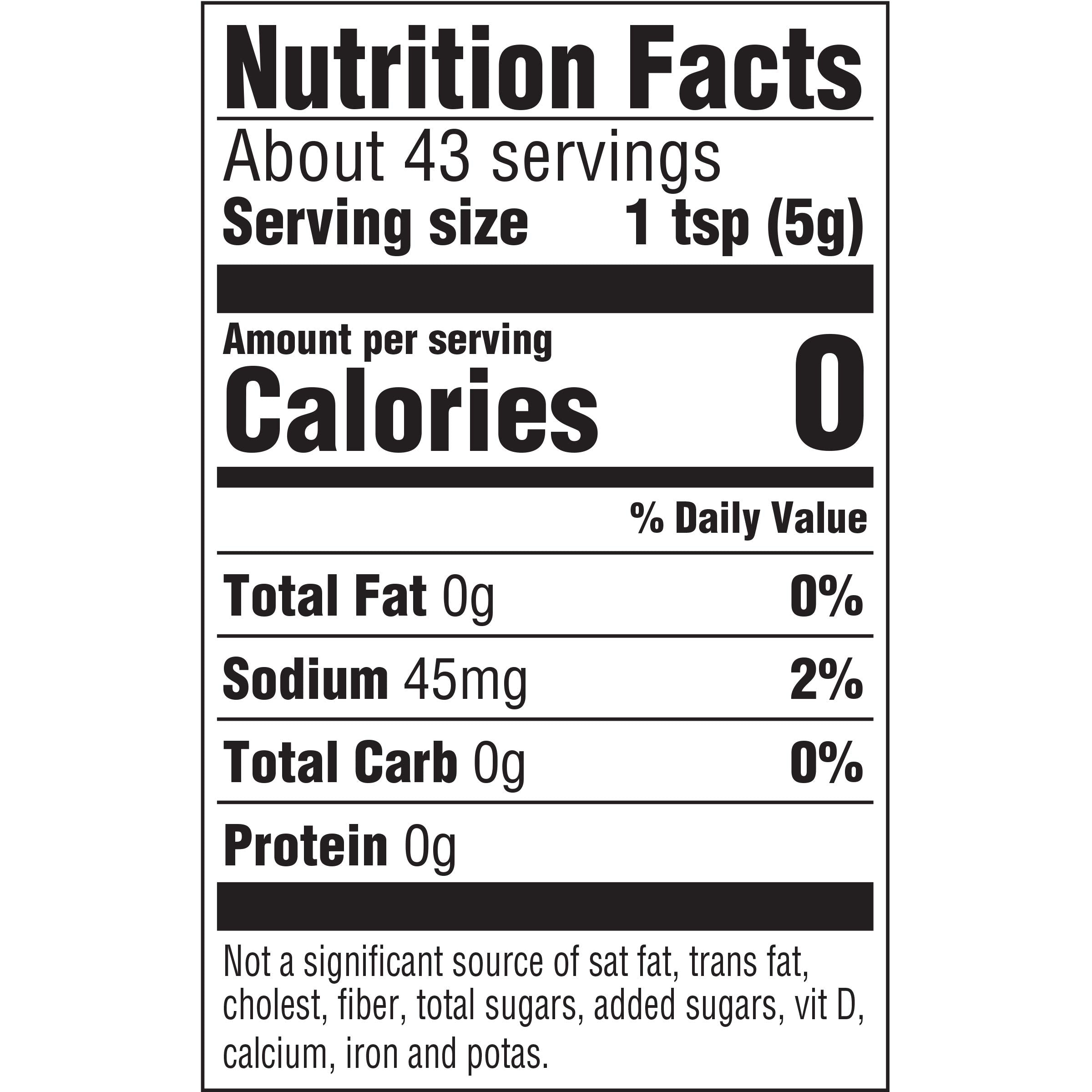 Taco Bell bottle held in hand showing 7.5 oz scale for serving planning