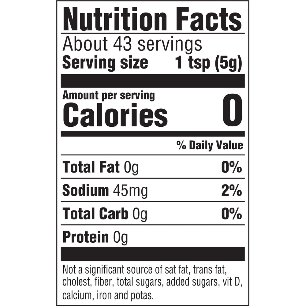 Taco Bell bottle held in hand showing 7.5 oz scale for serving planning
