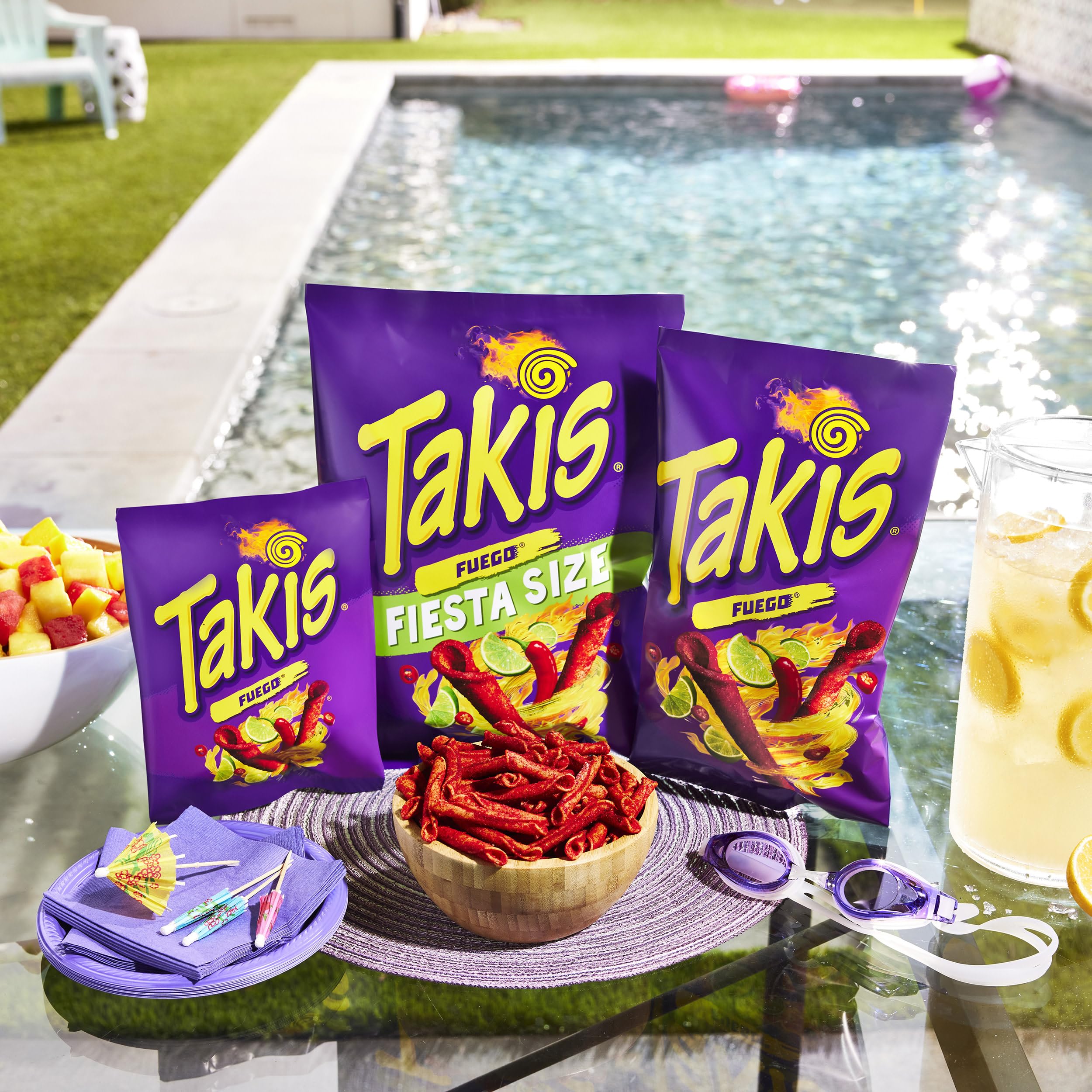 Close-up of Takis Fuego seasoning, displays intense chili and lime coating for bold flavor