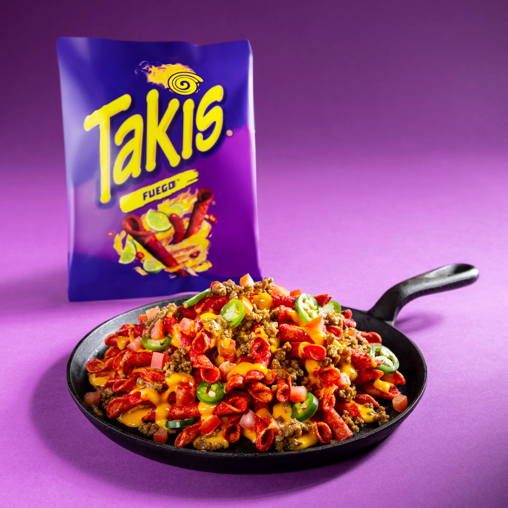 Bowl of Takis Fuego at a party, Takis adds spicy snack variety for gatherings