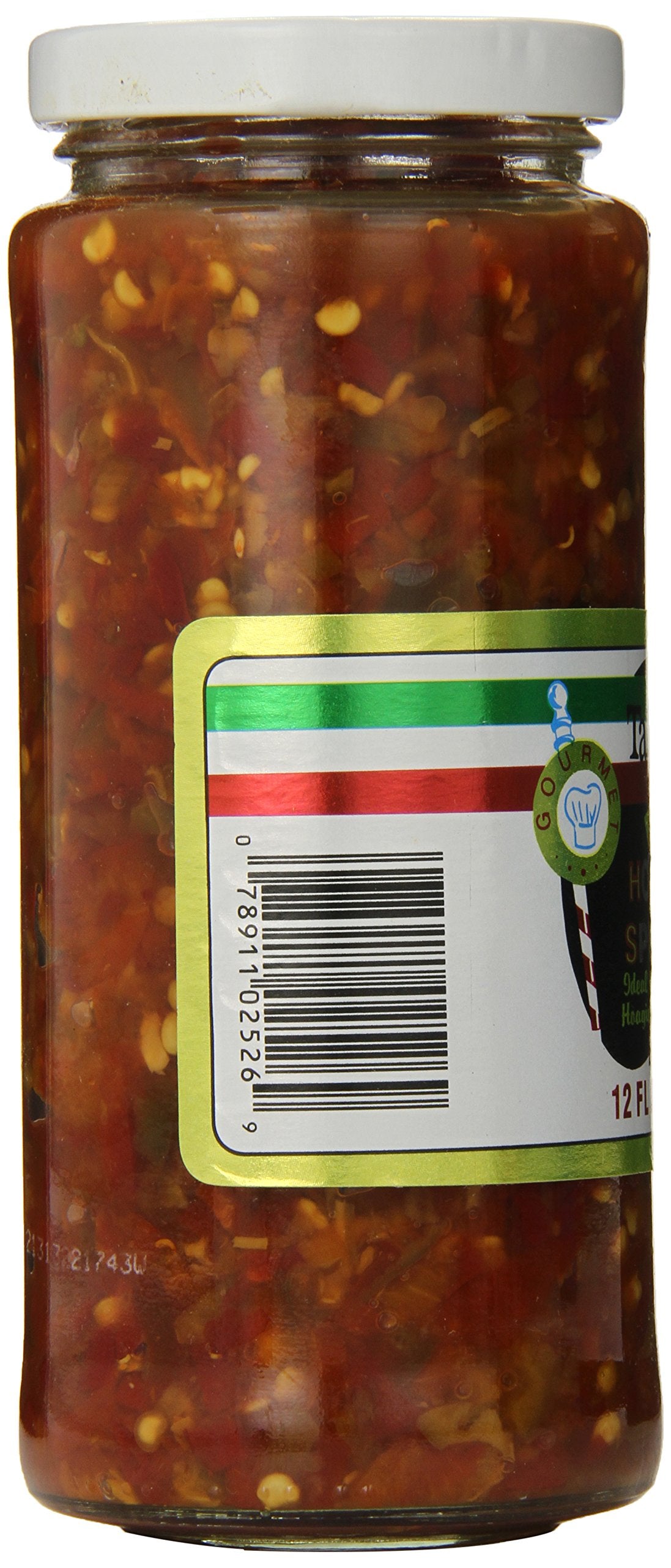 Tallarico'S spread applied to a hoagie roll in a lifestyle setting adding bold sandwich flavor