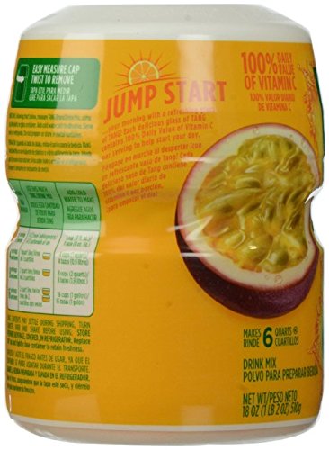 Glass of mixed TANG passion fruit drink demonstrating vibrant color