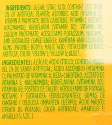 Hand holding 510g TANG canister showing portable pantry-friendly size