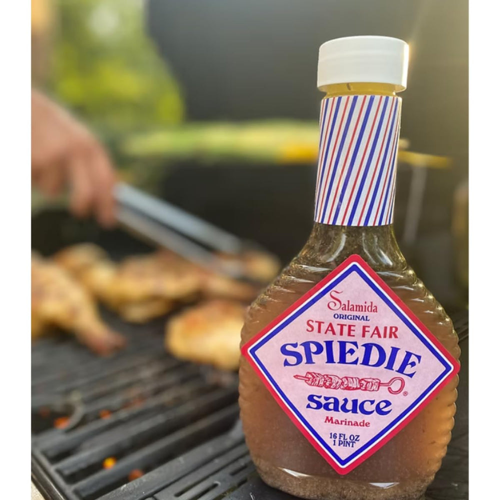 TAOindustry grilled chicken skewers glazed with Spiedie sauce, shows flavorful finished result