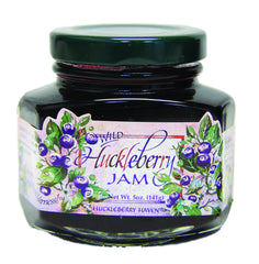Taste the Wilderness jar front label showing size and rustic huckleberry flavor benefit
