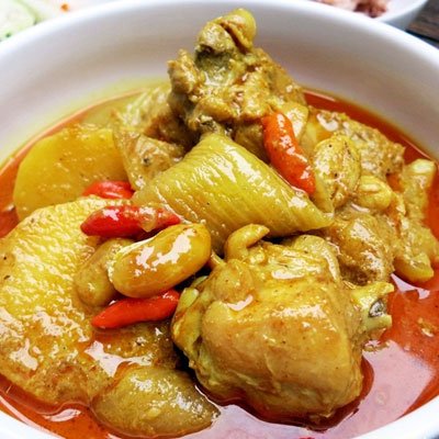 TastePadThai Mae Ploy red curry paste close-up texture highlighting rich color and depth