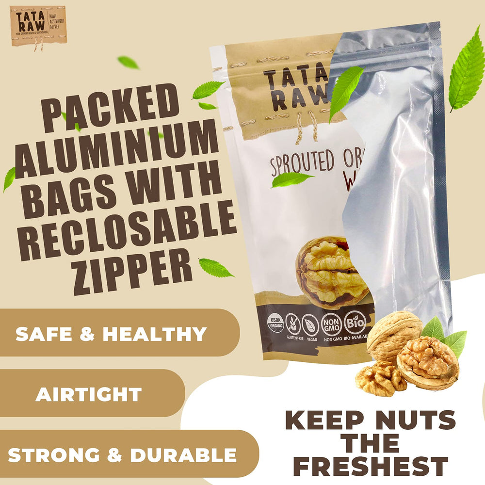 TATA RAW walnuts in hand to show size and portioning for meal prep