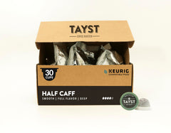 Tayst Coffee Roaster front packaging showing compostable pod and rich dark-roast benefit