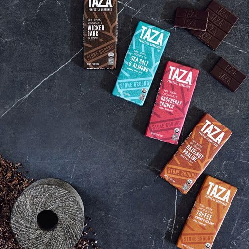 Taza bar in hand showing 2.5oz scale for portion and portability