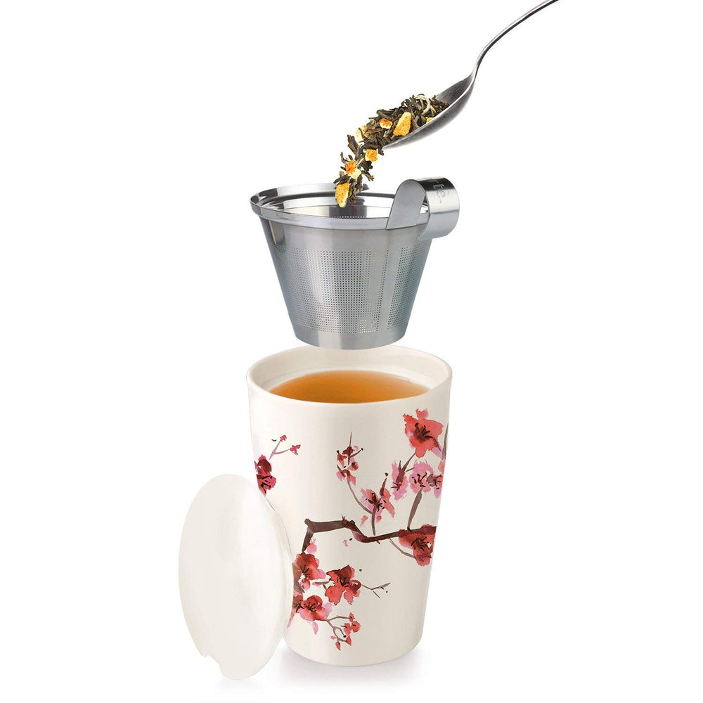 Tea Forte brewed cup of Earl Grey demonstrating clear amber color and serving suggestion