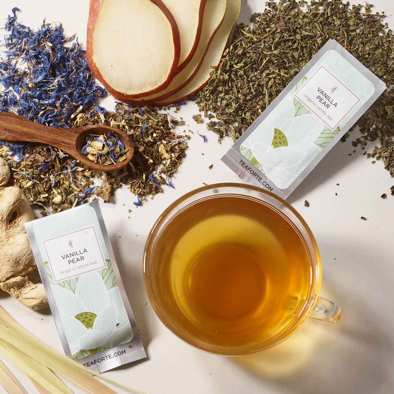 Tea Forte lifestyle scene on a table suggesting relaxing tea moments