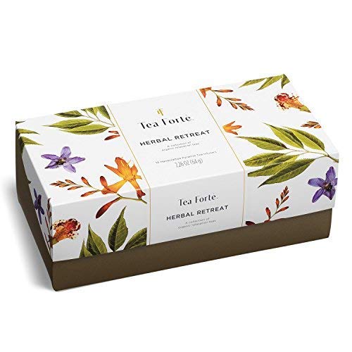 Tea Forté open box with twenty pyramid infusers neatly arranged for sampling
