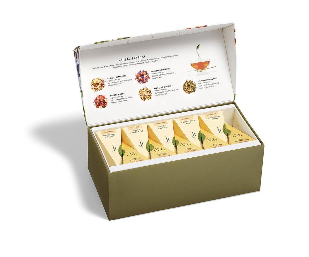 Tea Forté pyramid infuser close-up revealing whole-leaf bloom and aroma release