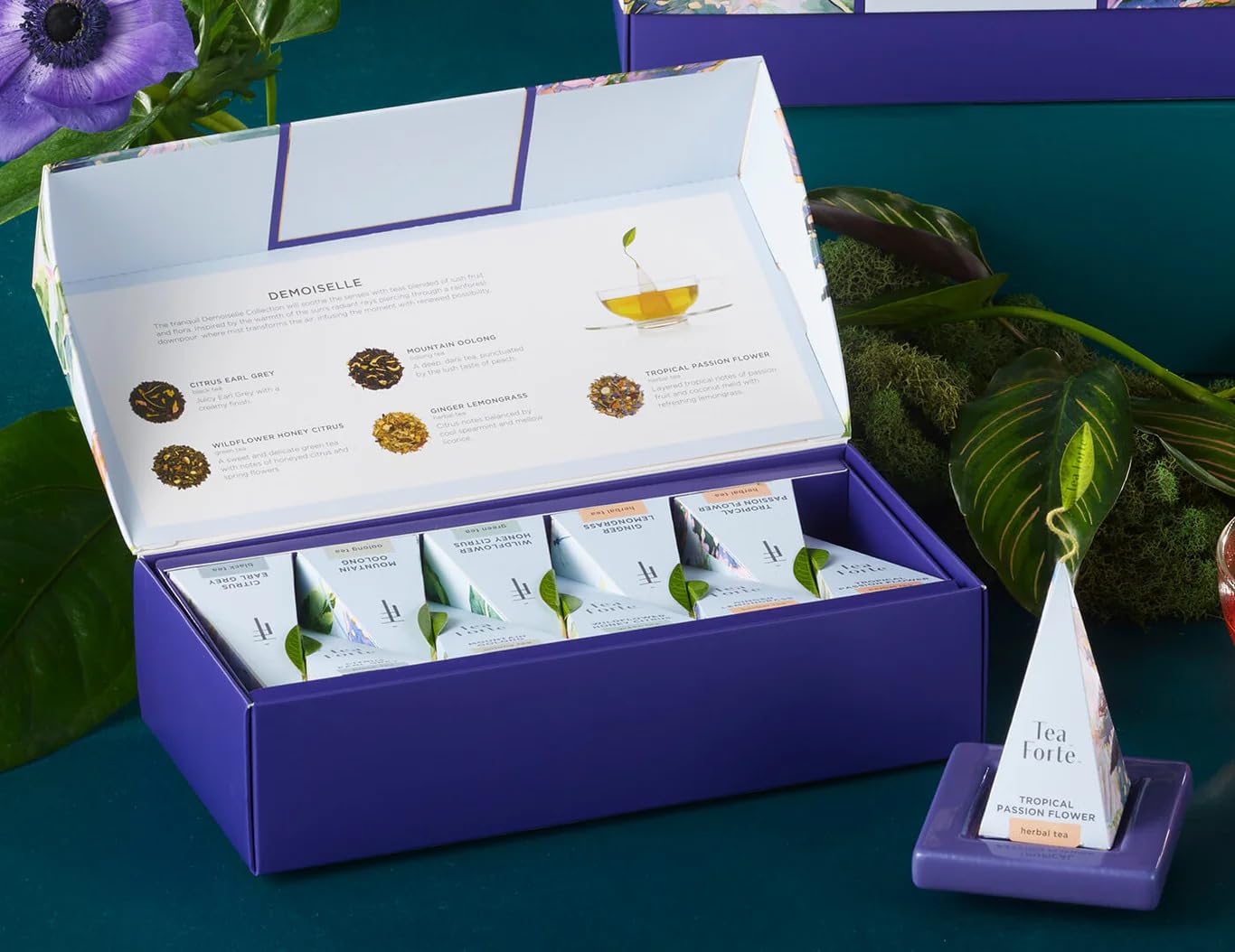 Tea Forte size comparison with coin showing compact sampler convenience benefit