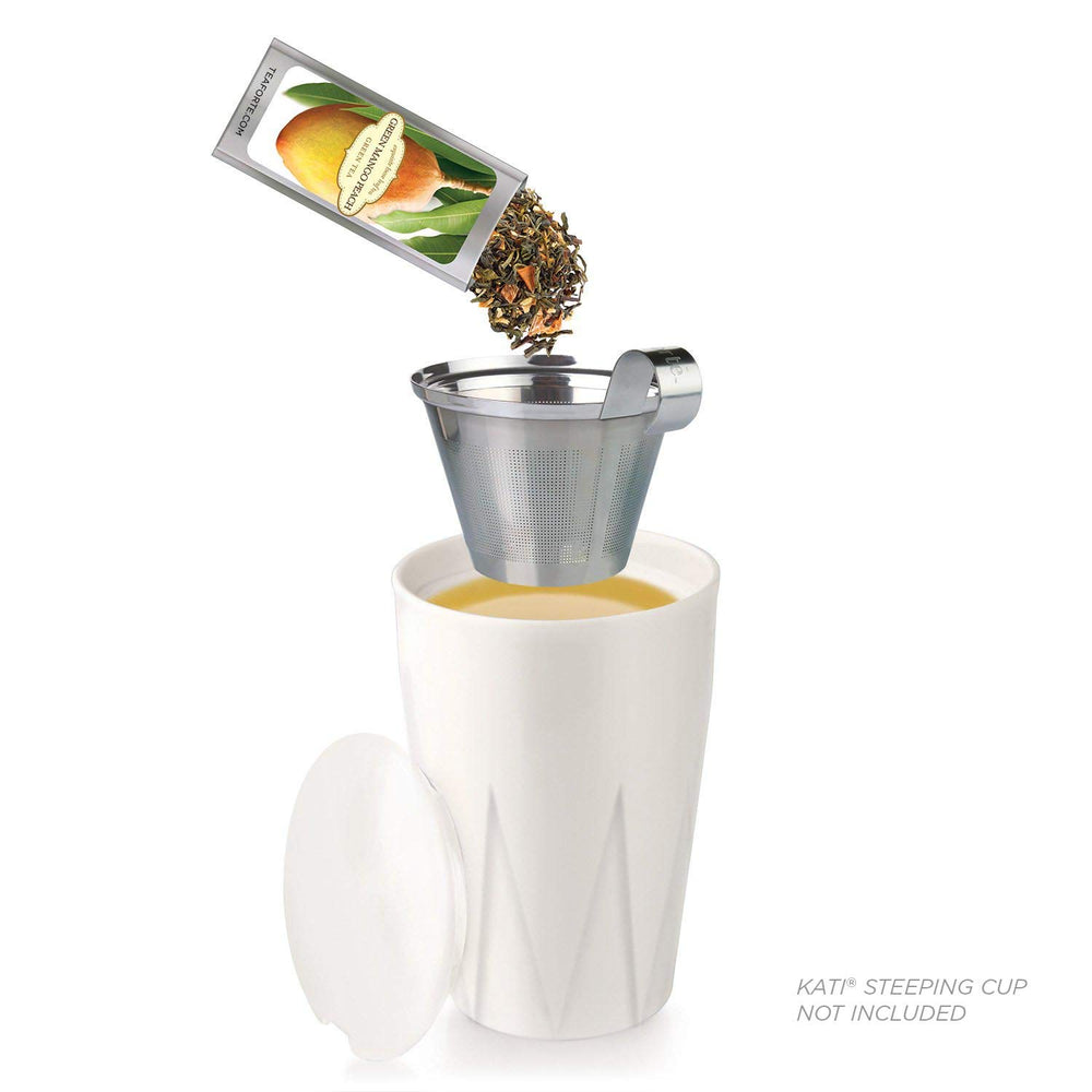 Tea Forte brewed green tea in a cup illustrating color and aroma
