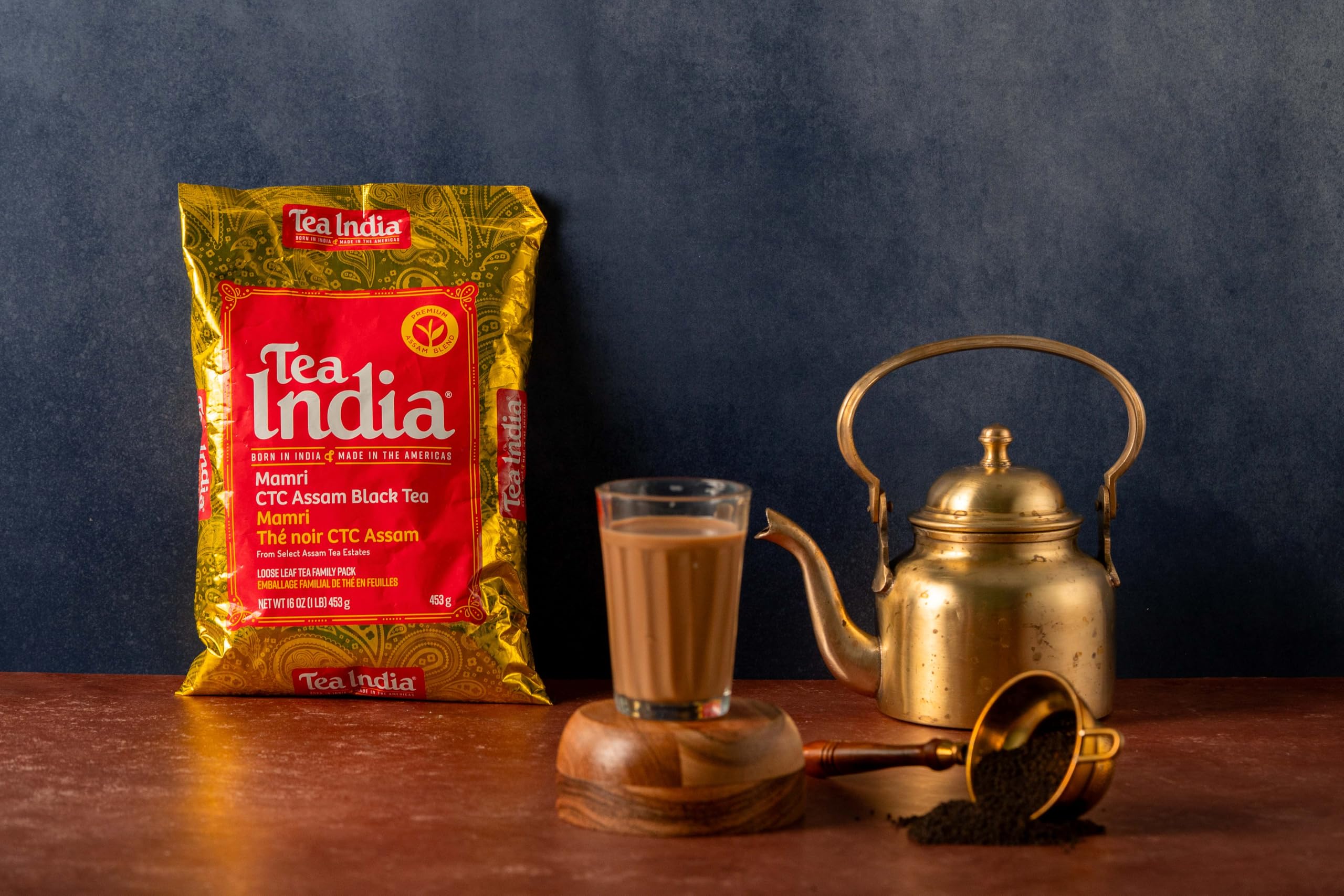 Tea India measured scoop on scale, illustrates precise portioning for consistent cups