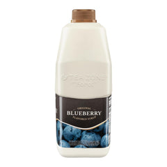 Tea Zone syrup pouring into glass to show smooth mixability and vivid blueberry flavor