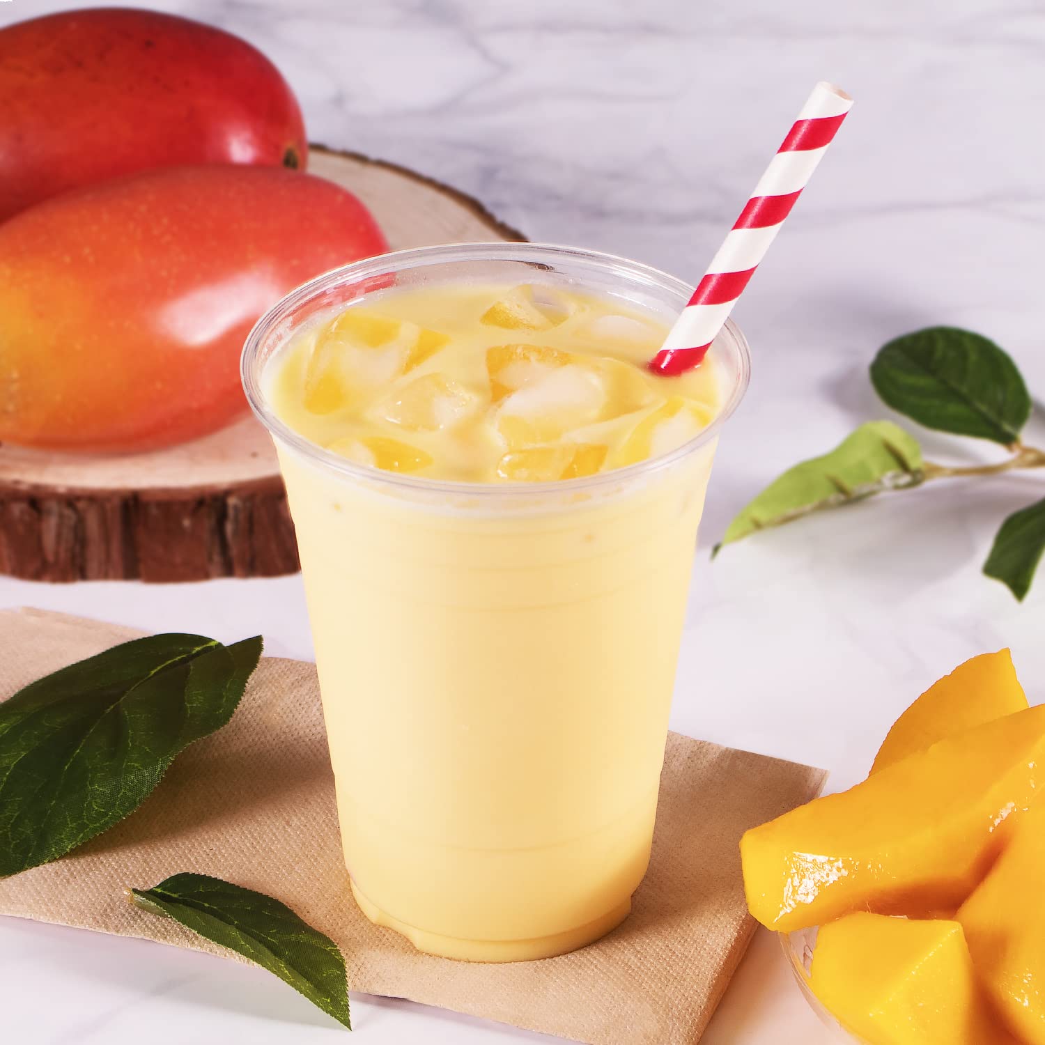 TEA ZONE prepared mango smoothie in glass illustrating vibrant flavor benefit