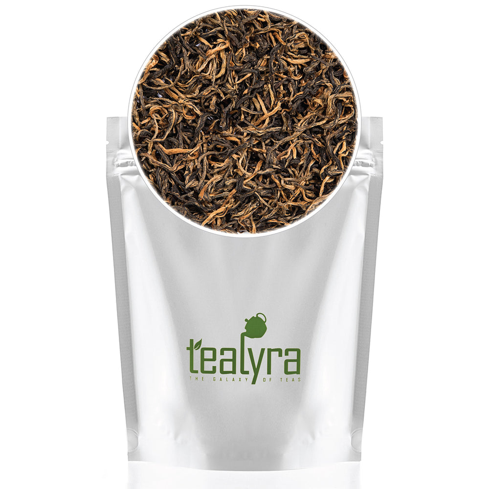 Tealyra loose leaves beside a scale showing 220g portion accuracy