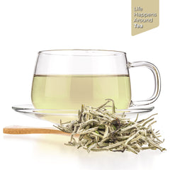 Tealyra brewed Silver Needle in glass teapot showing clear infusion and aroma