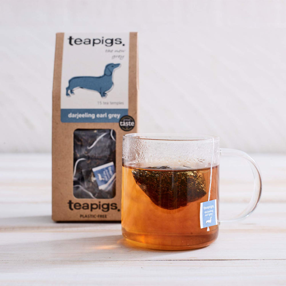 teapigs brewed cup in a home setting showing clear amber color and inviting aroma