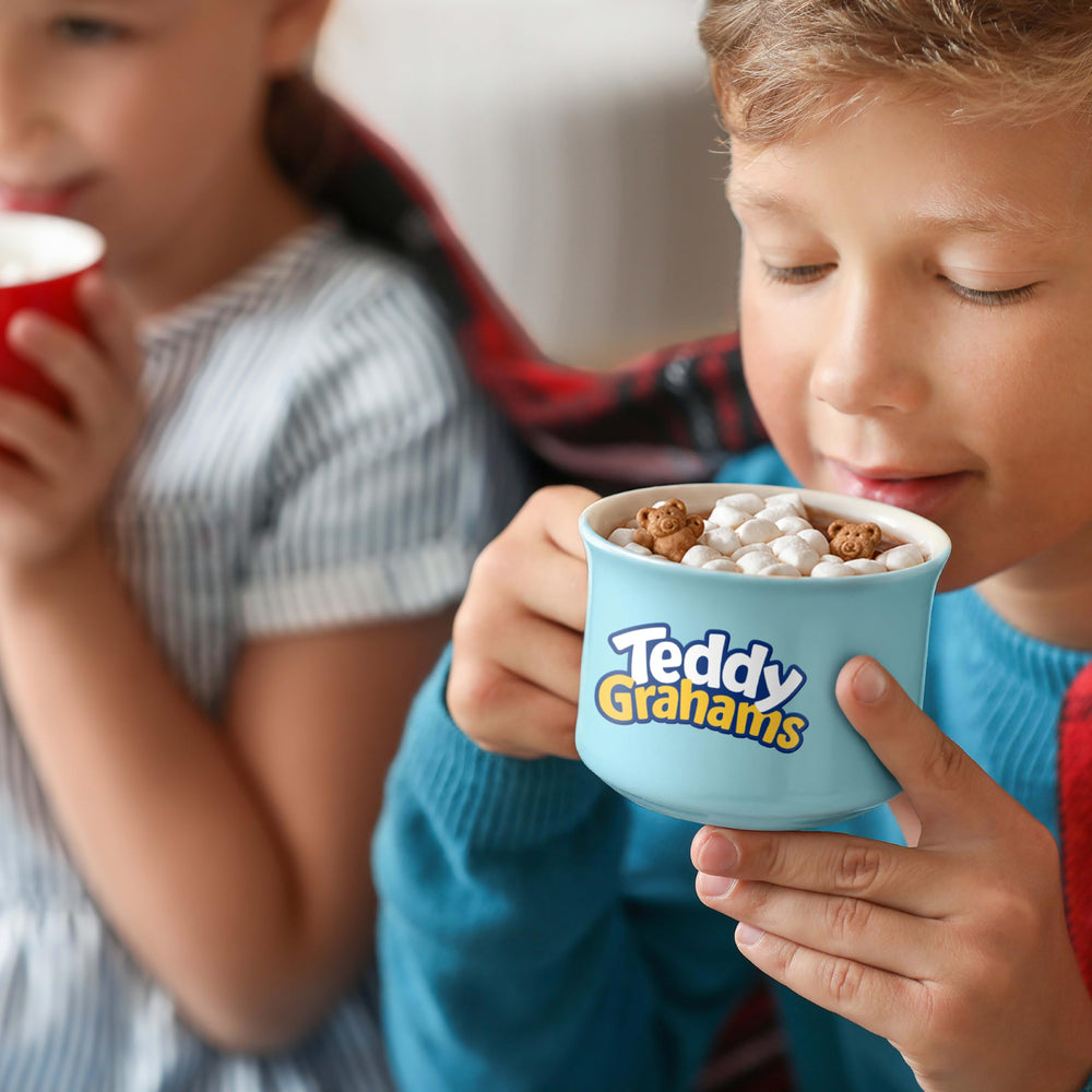 Teddy Grahams held in hand for scale showing portion size and portability