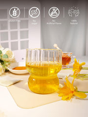 TeeLux brewed cup top view with amber color, displays clear flavorful steep