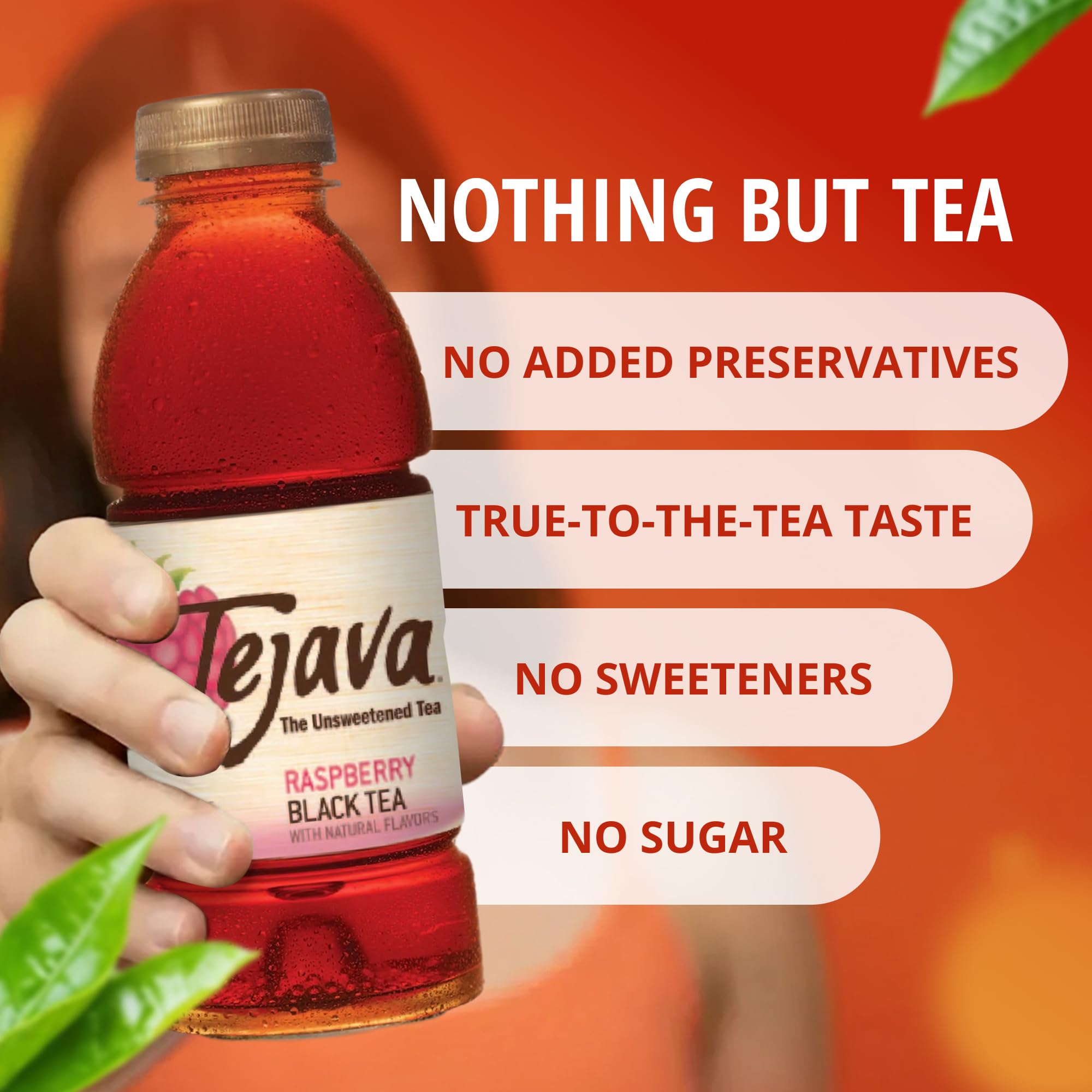 Tejava raspberry bottle in hand illustrating 16.9oz portable serving