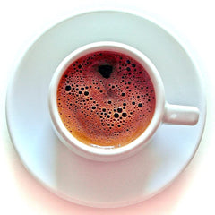 Terra Creta Bravo brewed Greek coffee in demitasse cups with foam illustrating serving presentation