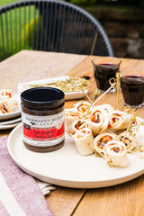 terrapin ridge jam spooned on charcuterie board enhancing cheese and cracker pairings